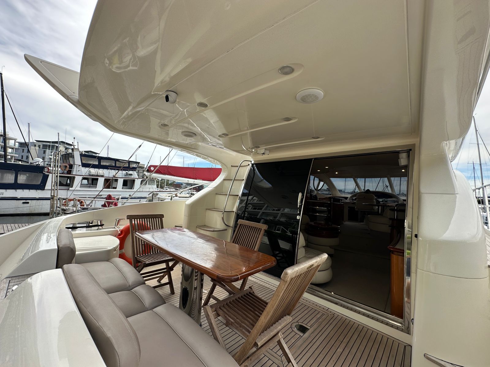 Aft cockpit dining aboard M/Y Alias